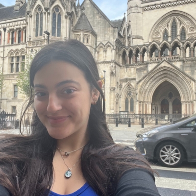 Student selfie in front of historic building.