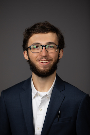 Headshot of Levi Malinoff.