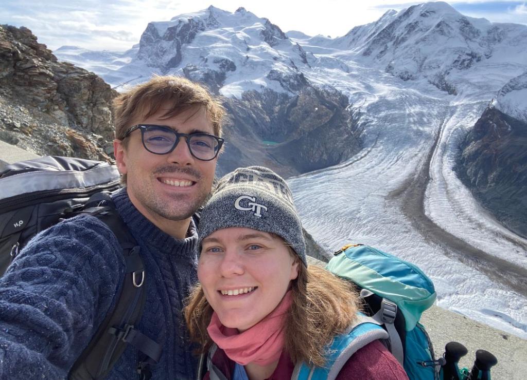 Shannon with her husband taking a selfie in the mountains